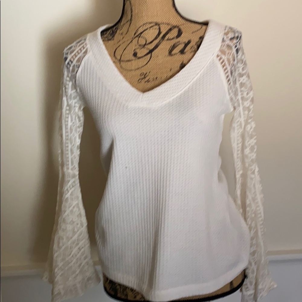 Thermal core top with lace bell sleeves NWOT.